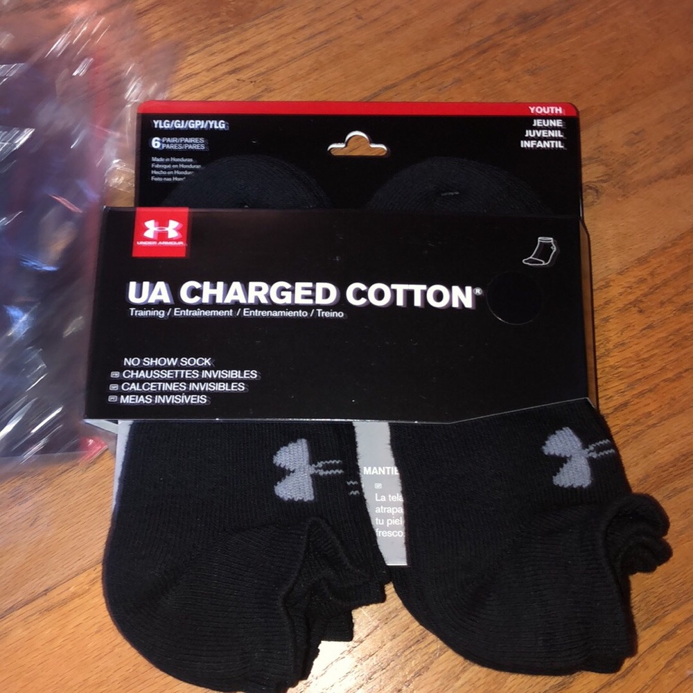 18 pairs of youth large under armour